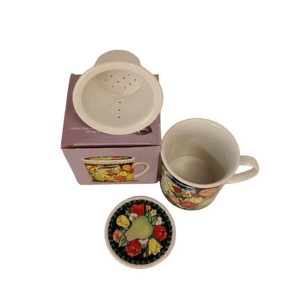 Tulips Hues and Brews Lidded Mug & Tea Infuser Insert Lid used as a coaster - Picture 2 of 7